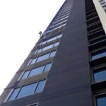 Rope Access Sri Lanka worker paint application on a Shangri-La Hotel