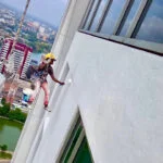 Rope Access Sri Lanka worker paint application on a Shangri-La Hotel